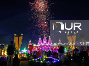 Fireworks light the sky at the illuminated Akshardham temple on the occasion of the 'Diwali' festival in Jaipur, Rajasthan, India, on Octobe...