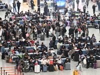 The waiting hall of Hongqiao Railway Station in Shanghai, China, on November 1, 2024, is crowded with passengers. Affected by Typhoon Kong-R...