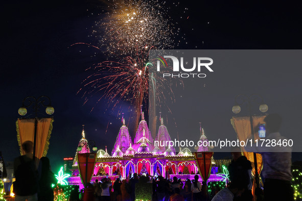 Fireworks light the sky at the illuminated Akshardham temple on the occasion of the 'Diwali' festival in Jaipur, Rajasthan, India, on Octobe...