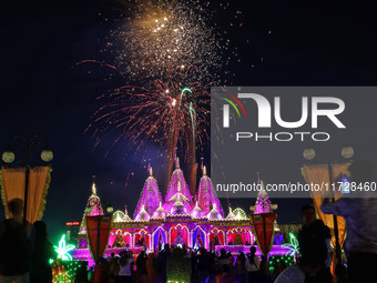 Fireworks light the sky at the illuminated Akshardham temple on the occasion of the 'Diwali' festival in Jaipur, Rajasthan, India, on Octobe...