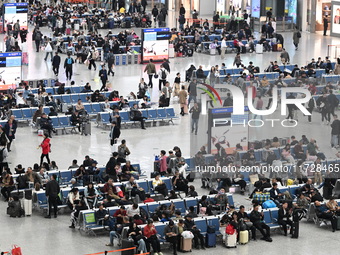 The waiting hall of Hongqiao Railway Station in Shanghai, China, on November 1, 2024, is crowded with passengers. Affected by Typhoon Kong-R...