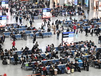 The waiting hall of Hongqiao Railway Station in Shanghai, China, on November 1, 2024, is crowded with passengers. Affected by Typhoon Kong-R...