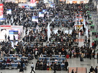 The waiting hall of Hongqiao Railway Station in Shanghai, China, on November 1, 2024, is crowded with passengers. Affected by Typhoon Kong-R...