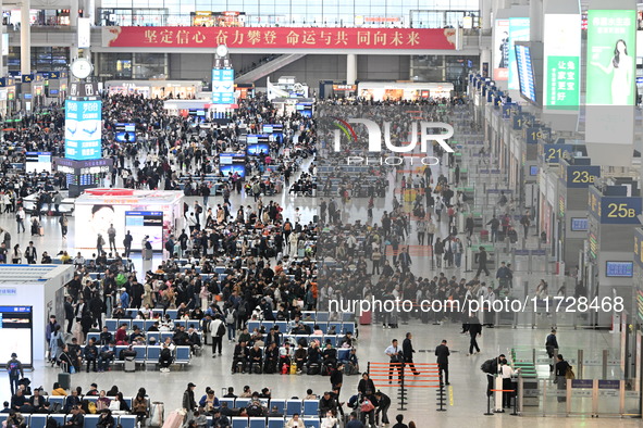 The waiting hall of Hongqiao Railway Station in Shanghai, China, on November 1, 2024, is crowded with passengers. Affected by Typhoon Kong-R...