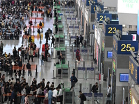 The waiting hall of Hongqiao Railway Station in Shanghai, China, on November 1, 2024, is crowded with passengers. Affected by Typhoon Kong-R...