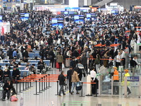 The waiting hall of Hongqiao Railway Station in Shanghai, China, on November 1, 2024, is crowded with passengers. Affected by Typhoon Kong-R...