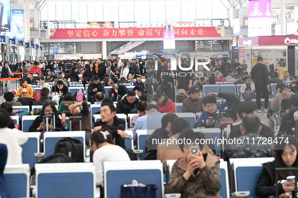 The waiting hall of Hongqiao Railway Station in Shanghai, China, on November 1, 2024, is crowded with passengers. Affected by Typhoon Kong-R...