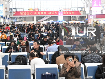 The waiting hall of Hongqiao Railway Station in Shanghai, China, on November 1, 2024, is crowded with passengers. Affected by Typhoon Kong-R...