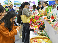 Visitors learn about Huamo products at the 2024 Yantai International Food (Prepared Dish) Industry Expo in Yantai, China, on November 1, 202...