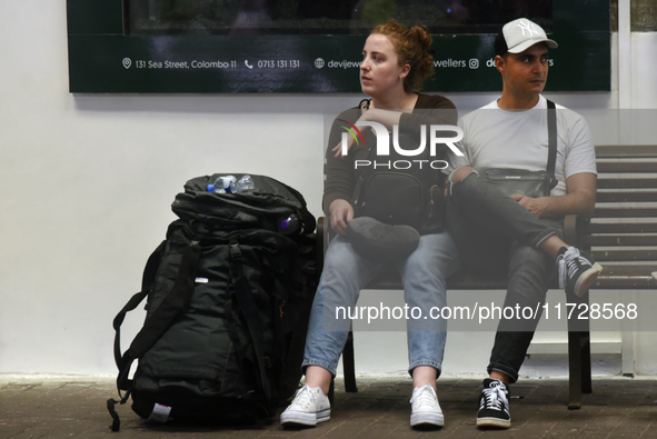 A group of tourists waits for the train at Colombo railway station in Colombo, Sri Lanka, on November 1, 2024. The tourism sector shows rema...