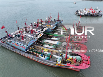 A large number of fishing boats berth in the harbor to take shelter from Typhoon Kong-Rey at the Liandao Central fishing port in Lianyungang...