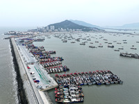 A large number of fishing boats berth in the harbor to take shelter from Typhoon Kong-Rey at the Liandao Central fishing port in Lianyungang...