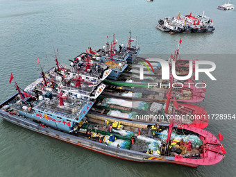 A large number of fishing boats berth in the harbor to take shelter from Typhoon Kong-Rey at the Liandao Central fishing port in Lianyungang...