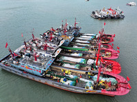 A large number of fishing boats berth in the harbor to take shelter from Typhoon Kong-Rey at the Liandao Central fishing port in Lianyungang...