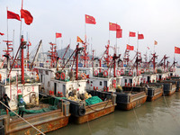 A large number of fishing boats berth in the harbor to take shelter from Typhoon Kong-Rey at the Liandao Central fishing port in Lianyungang...