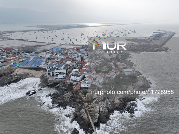 A large number of fishing boats berth in the harbor to take shelter from Typhoon Kong-Rey at the Liandao Central fishing port in Lianyungang...