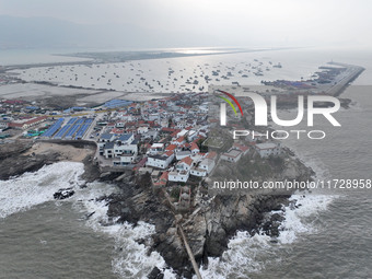 A large number of fishing boats berth in the harbor to take shelter from Typhoon Kong-Rey at the Liandao Central fishing port in Lianyungang...