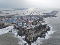 A large number of fishing boats berth in the harbor to take shelter from Typhoon Kong-Rey at the Liandao Central fishing port in Lianyungang...