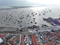 A large number of fishing boats berth in the harbor to take shelter from Typhoon Kong-Rey at the Liandao Central fishing port in Lianyungang...