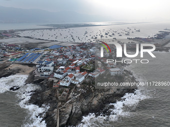 A large number of fishing boats berth in the harbor to take shelter from Typhoon Kong-Rey at the Liandao Central fishing port in Lianyungang...