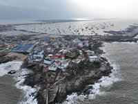 A large number of fishing boats berth in the harbor to take shelter from Typhoon Kong-Rey at the Liandao Central fishing port in Lianyungang...