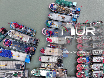 A large number of fishing boats berth in the harbor to take shelter from Typhoon Kong-Rey at the Liandao Central fishing port in Lianyungang...