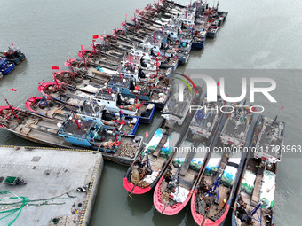 A large number of fishing boats berth in the harbor to take shelter from Typhoon Kong-Rey at the Liandao Central fishing port in Lianyungang...