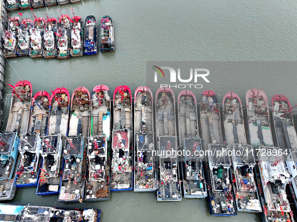 A large number of fishing boats berth in the harbor to take shelter from Typhoon Kong-Rey at the Liandao Central fishing port in Lianyungang...