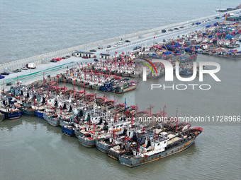 A large number of fishing boats berth in the harbor to take shelter from Typhoon Kong-Rey at the Liandao Central fishing port in Lianyungang...