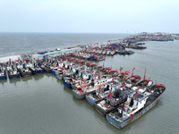 A large number of fishing boats berth in the harbor to take shelter from Typhoon Kong-Rey at the Liandao Central fishing port in Lianyungang...