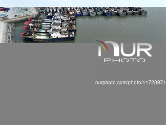 A large number of fishing boats berth in the harbor to take shelter from Typhoon Kong-Rey at the Liandao Central fishing port in Lianyungang...