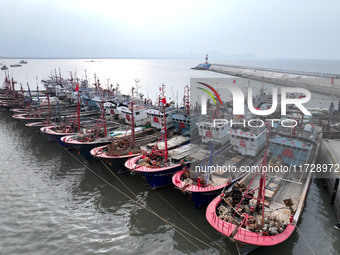 A large number of fishing boats berth in the harbor to take shelter from Typhoon Kong-Rey at the Liandao Central fishing port in Lianyungang...