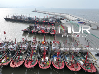 A large number of fishing boats berth in the harbor to take shelter from Typhoon Kong-Rey at the Liandao Central fishing port in Lianyungang...