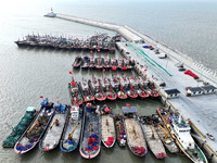 A large number of fishing boats berth in the harbor to take shelter from Typhoon Kong-Rey at the Liandao Central fishing port in Lianyungang...