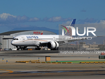 A Boeing 787-8 Dreamliner from United Airlines begins its takeoff run at Barcelona El Prat Airport in Barcelona, Spain, on October 8, 2024....