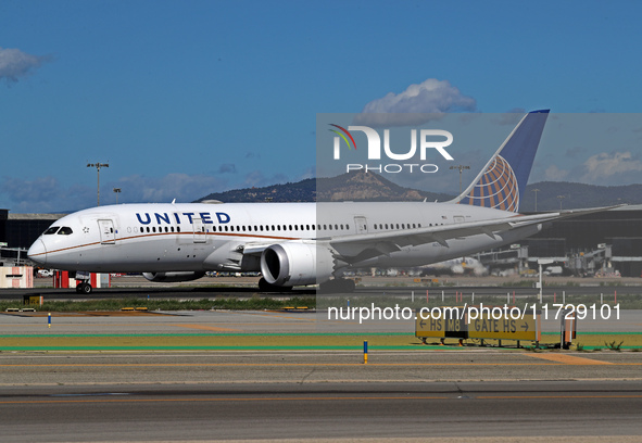 A Boeing 787-8 Dreamliner from United Airlines begins its takeoff run at Barcelona El Prat Airport in Barcelona, Spain, on October 8, 2024. 