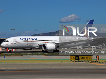 A Boeing 787-8 Dreamliner from United Airlines begins its takeoff run at Barcelona El Prat Airport in Barcelona, Spain, on October 8, 2024....