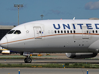 A Boeing 787-8 Dreamliner from United Airlines begins its takeoff run at Barcelona El Prat Airport in Barcelona, Spain, on October 8, 2024....