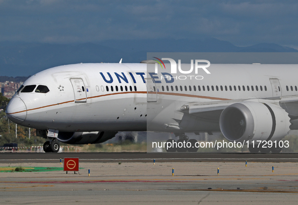 A Boeing 787-8 Dreamliner from United Airlines begins its takeoff run at Barcelona El Prat Airport in Barcelona, Spain, on October 8, 2024. 