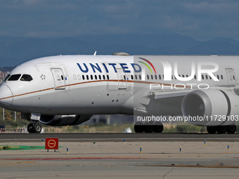 A Boeing 787-8 Dreamliner from United Airlines begins its takeoff run at Barcelona El Prat Airport in Barcelona, Spain, on October 8, 2024....