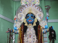 A clay idol of the Hindu goddess Kali is inside a ''pandal'' (a temporary platform), a decorated structure, on the occasion of the Kali Puja...