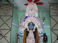 A clay idol of the Hindu goddess Kali is inside a ''pandal'' (a temporary platform), a decorated structure, on the occasion of the Kali Puja...