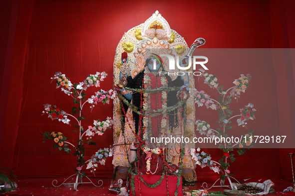 A clay idol of the Hindu goddess Kali is inside a ''pandal'' (a temporary platform), a decorated structure, on the occasion of the Kali Puja...