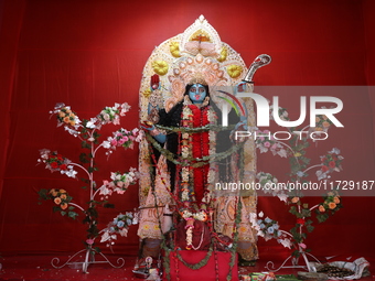 A clay idol of the Hindu goddess Kali is inside a ''pandal'' (a temporary platform), a decorated structure, on the occasion of the Kali Puja...