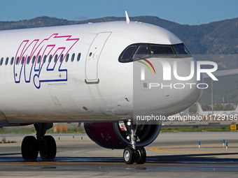 An Airbus A321-271NX from Wizz Air is on the runway ready to take off from Barcelona airport in Barcelona, Spain, on October 8, 2024. (