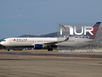 A Boeing 767-332(ER) from Delta Air Lines is on the runway ready to take off from Barcelona airport in Barcelona, Spain, on October 8, 2024....