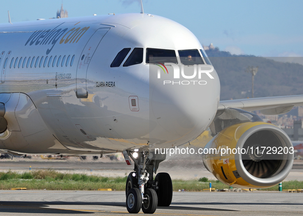 An Airbus A320-232 from Vueling is on the runway ready to take off from Barcelona airport in Barcelona, Spain, on October 8, 2024. 