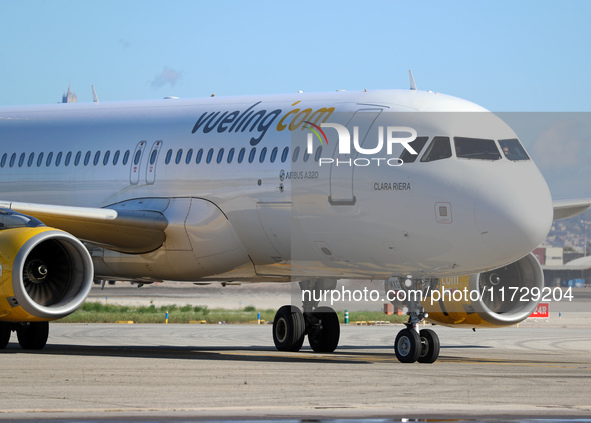 An Airbus A320-232 from Vueling is on the runway ready to take off from Barcelona airport in Barcelona, Spain, on October 8, 2024. 