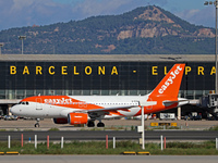 An Airbus A319-111 from easyJet is on the runway ready to take off from Barcelona airport in Barcelona, Spain, on October 8, 2024. (