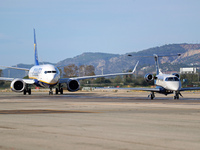 An Embraer Phenom 300 from Padaviation company is on the runway ready to take off from Barcelona airport in Barcelona, Spain, on October 8,...